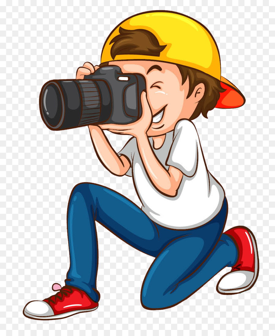 a young boy taking a photograph
